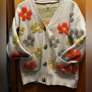 Gently worn En Crème flower power sweater